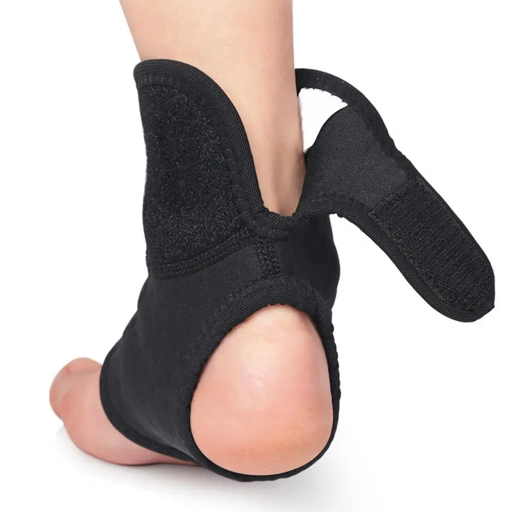 Adjustable ankle support brace in black, designed for comfort and support on a foot