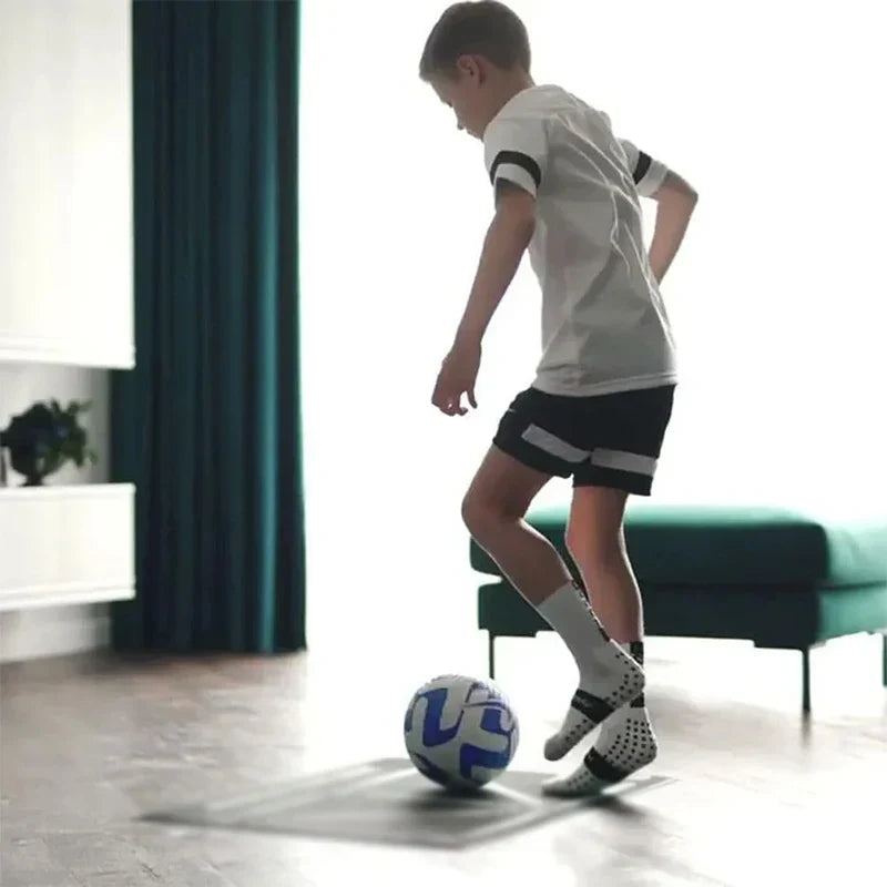 Football Training Kids Playmaker Using