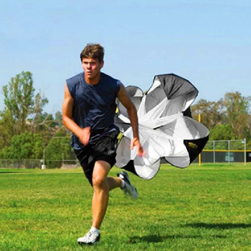 A man running with the drag parachute